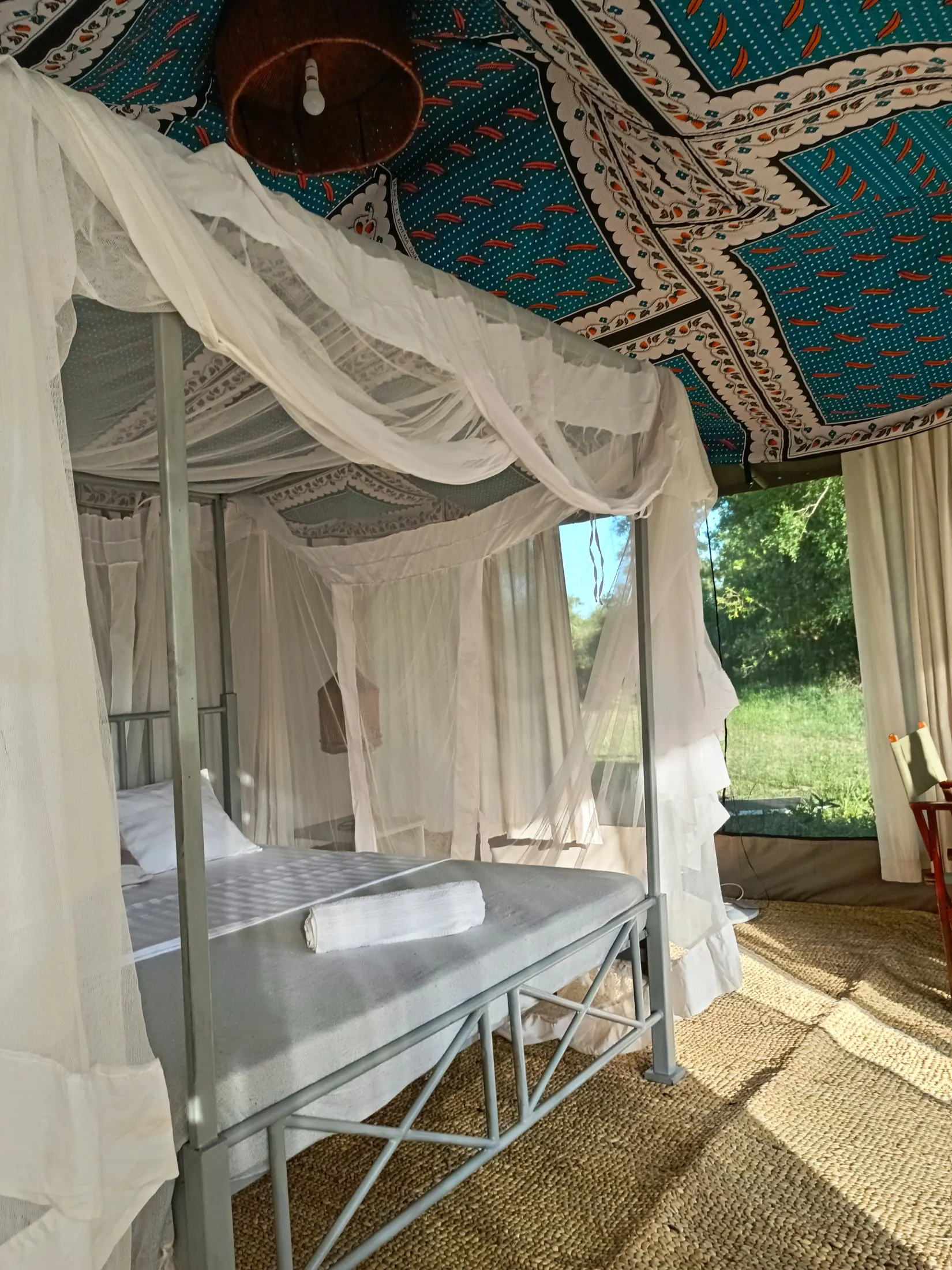 Daylit tent interior with patterned canvas